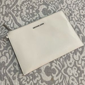 Michael Kors White wristlet clutch wallet or makeup bag.